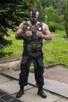 Lviv, Ukraine - May 23,2015: Man  dressed in the style of the strongman performs  at the festival cosplay Anicon in Lviv May 23.2015