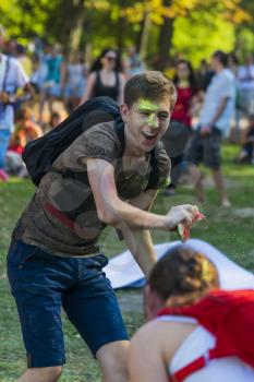 Lviv, Ukraine - August 30, 2015: Man  have fun during the festival watermelon  in a city park in Lviv.