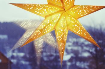 Merry Christmas and Happy New Year festive card. Christmas Star decoration . Holiday composition. Festive background