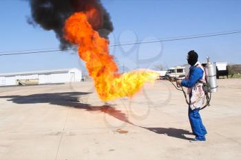 Flamethrower in action. a Flamethrower operational test.