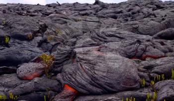 Current lava on the surface of the earth. Liquid lava.