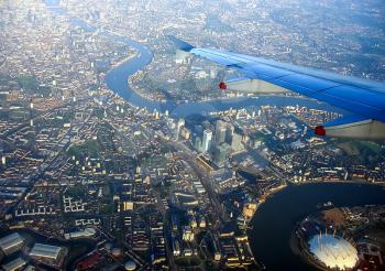 The span of the aircraft over the city, the view from the porthole.