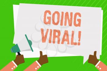 Conceptual hand writing showing Going Viral. Concept meaning video or image spread quickly and widely among internet users Hand Holding Megaphone and Gesturing Thumbs Up Text Balloon