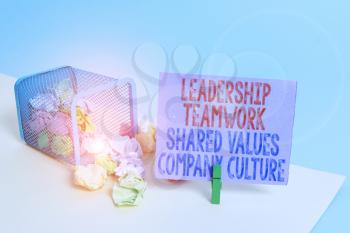 Word writing text Leadership Teamwork Shared Values Company Culture. Business photo showcasing Group Team Success Trash bin crumpled paper clothespin empty reminder office supplies tipped
