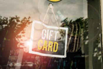 Text sign showing Gift Card. Business photo text A present usually made of paper that contains your message Empty black board with copy space for advertising. Blank dark board