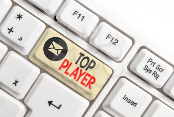 Word writing text Top Player. Business photo showcasing being best in sports game like football or electronic ones White pc keyboard with empty note paper above white background key copy space