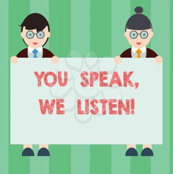 Handwriting text writing You Speak We Listen. Concept meaning Communicate to us your feelings and information Male and Female in Uniform Standing Holding Blank Placard Banner Text Space