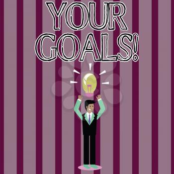 Handwriting text Your Goals. Conceptual photo something that you hope to achieve or get in near or far future Businessman Standing Raising Arms Upward with Lighted Bulb Icon on his Head