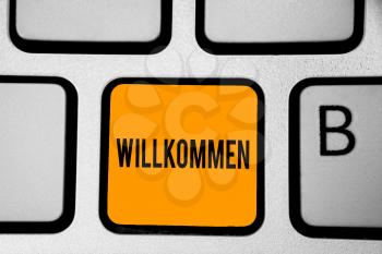Text sign showing Willkommen. Conceptual photo welcoming people event or your home something to that effect Keyboard orange key Intention create computer computing reflection document