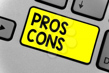Writing note showing Pros Cons. Business photo showcasing The favorable and unfavorable factors or reasons of person Keyboard yellow key Intention computer computing reflection document