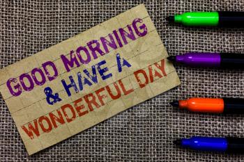 Handwriting text writing Good Morningand Have A Wonderful Day. Concept meaning greeting someone in start of the day Paperboard computer mouse jute background Expressing ideas typing needs