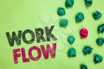Text sign showing Work Flow. Conceptual photo Continuity of a certain task to and from an office or employer Crumpled wrinkled papers one different pink unique special green background