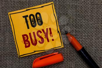Conceptual hand writing showing Too Busy. Business photo showcasing No time to relax no idle time for have so much work or things to do Orange paper Marker Communicate ideas Jute background