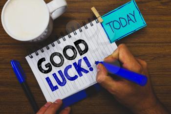 Word writing text Good Luck. Business concept for A positive fortune or a happy outcome that a person can have Man holding marker notebook clothespin reminder wooden table cup coffee