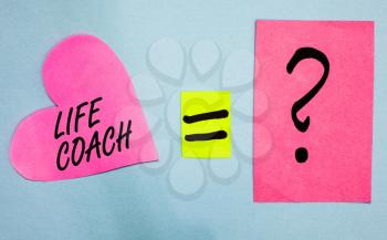 Text sign showing Life Coach. Conceptual photo A person who advices clients how to solve their problems or goals Pink paper notes heart equal sign question mark important answer romantic