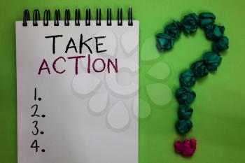Text sign showing Take Action. Conceptual photo advices someone to do something or reaction right now Open notebook crumpled papers forming question mark green background