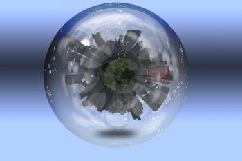 City with tree tops in crystal ball