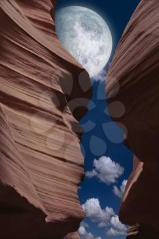 Red rock canyon. Full moon in the sky. 3d rendering