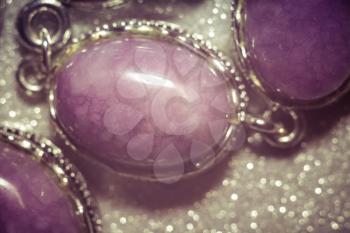 Vintage silver jewelry with purple pink stone, kunzite, agate or quartz, filtered.