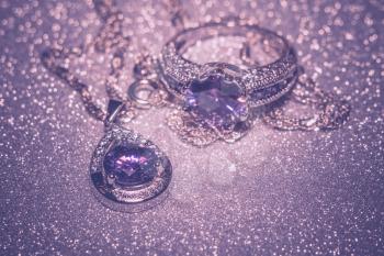 Fashion silver pendant with purple zirconia, amethyst imitation, filtered.