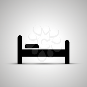 Bed silhouette, side view simple black icon with shadow