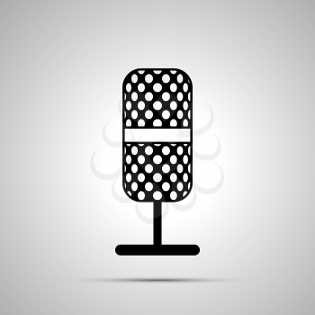 Microphone silhouette, simple black icon with shadow