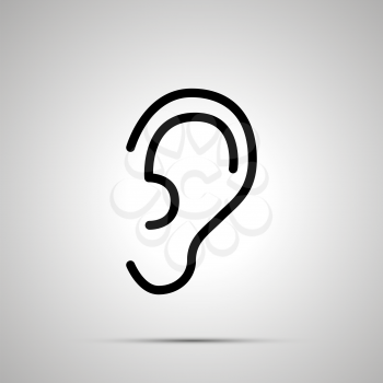 Simple black human ear icon with with shadow on gray