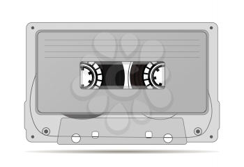 Gray audio cassette with magnetic tape, vintage object on white
