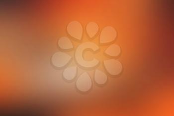 Abstract colorful smooth blurred background in soft orange colours