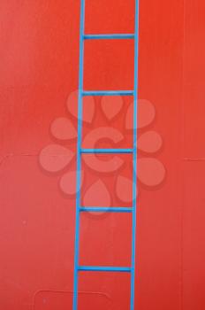 Blue metal ladder on a ferry boat. Abstract geometric background.