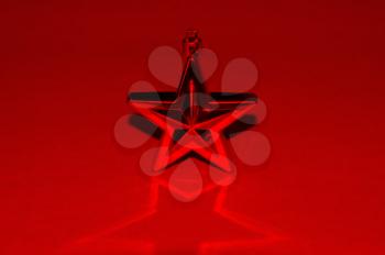 Red star bauble decorative christmas ornament background.