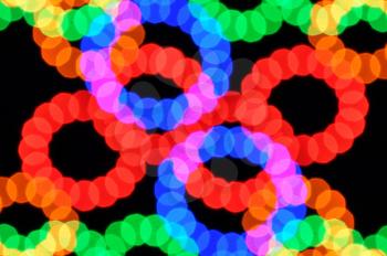 Blurry light dots and colorful circles abstract background.