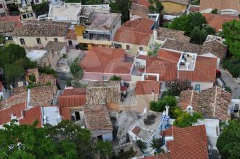 Panoramic view of the traditional Anafiotika neighborhood a maze of narrow streets and small houses built under the Acropolis by migrants from the Cycladic island of Anafi. Village style architecture in the city of Athens, Greece.