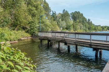 A veiw of a walkway over the water at Coulon Park in Renton, Washington.