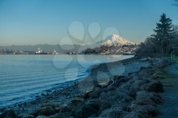 View of Mount Rainier from the Ruston area of Tacoma, Washington. The mountain glows in the evening twilight.