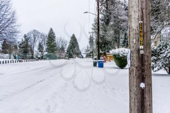 Snow cover a street in Burien, Washington.