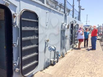 Large metal door water tight hatch open on USS Iowa naval warship destroyer battleship