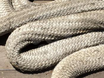 Rope large braided mooring line for ships boat background element on USS Iowa naval warship destroyer battleship