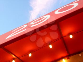 Red canopy awning with yellow light bulbs restaurant atmosphere background with number 290