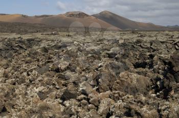 Los Volcanes Natural Park and Timanfaya National Park in the background. Lanzarote. Canary Islands. Spain.