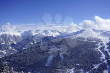 Mountain view on fair weather with blue sky and snow in winter, Stubnerkogel, Bad Gastein, Austria