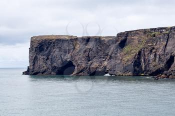 The small peninsula, or promontory, Dyrholaey (120m) (formerly known as Cape Portland by English seamen) is located on the south coast of Iceland, not far from the village Vik. It was formerly an island of volcanic origin.