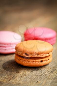 three different kind of macarons on a table 
