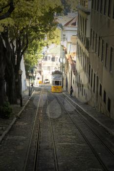 LISBON-PORTUGAL NOVEMBER 11, 2015: In operation since 1873, The Lisbon tramway network serves the municipality of Lisbon, Portugal. Yellow tramway are popular with the tourists.