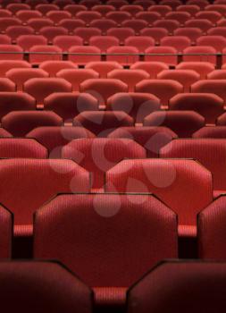 Close up of generic red theater seats