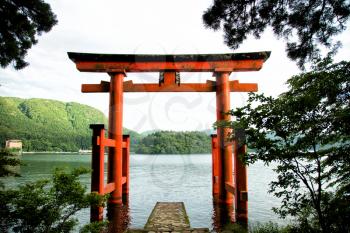 Orange tori gate in Moto Hakone along the Ashi lake in japan
